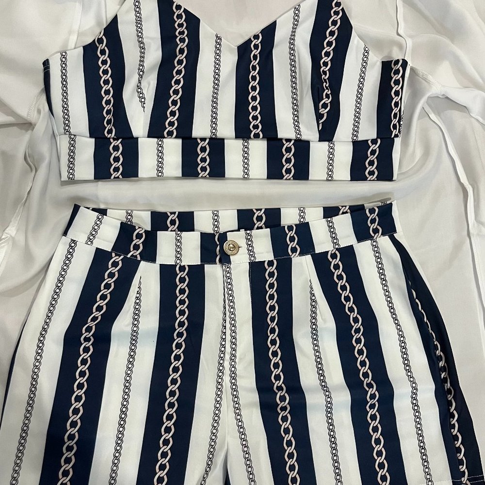 White and Navy Top and Short Set With Gold and Pink Accents